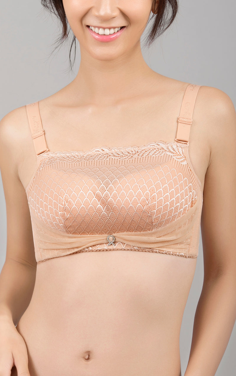 Front view of beige wireless strapless push-up contour bra with removable convertible straps
