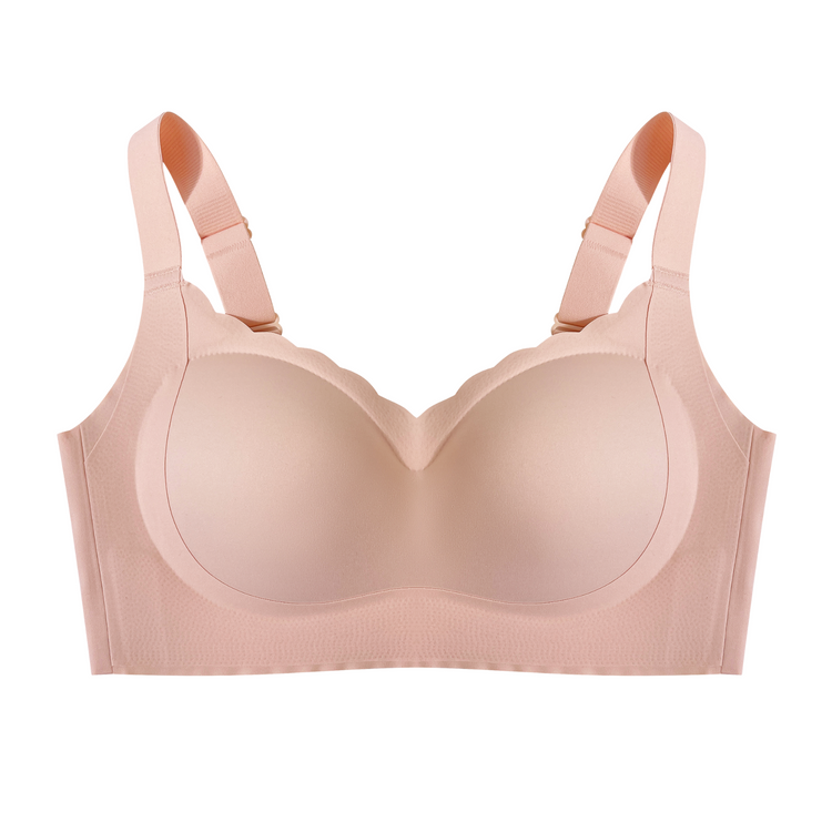 A beige wireless bra on a plain background, highlighting the soft fabric and wide straps.