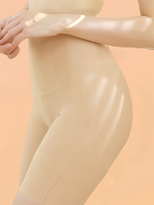 Side view of a woman wearing high-waist seamless compression shapewear, highlighting the ergonomic design and snug fit.