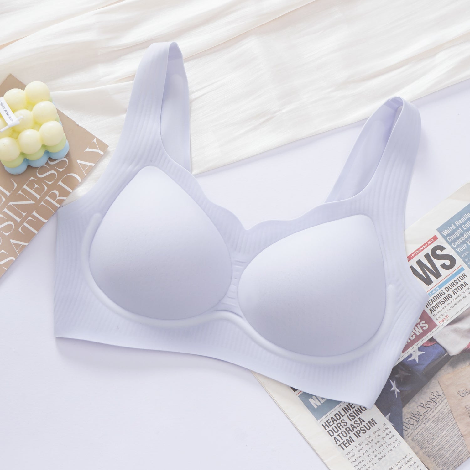 Side view of green wireless seamless contour bra highlighting breathable fabric design