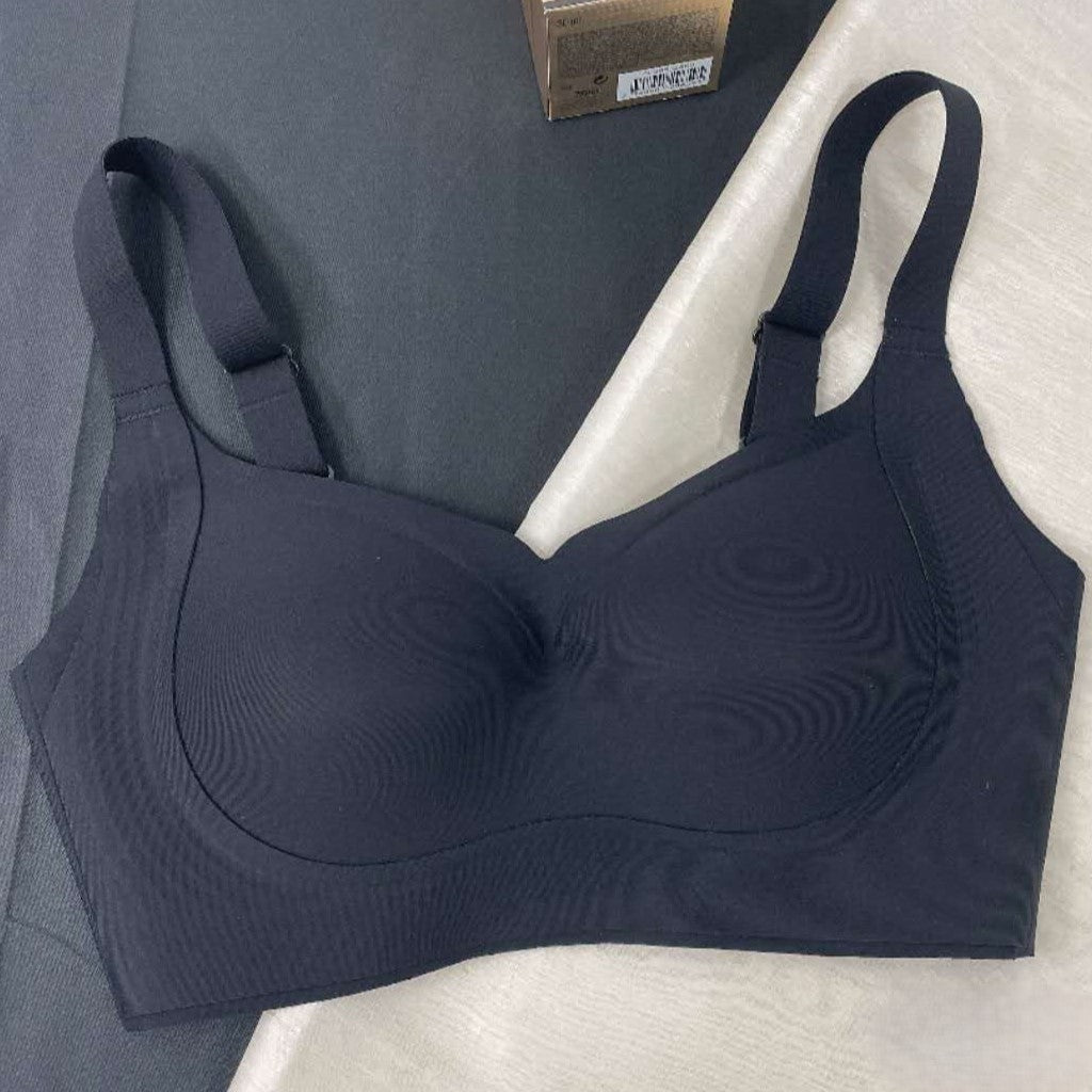 Back view of green wireless seamless contour bra highlighting seamless invisible design