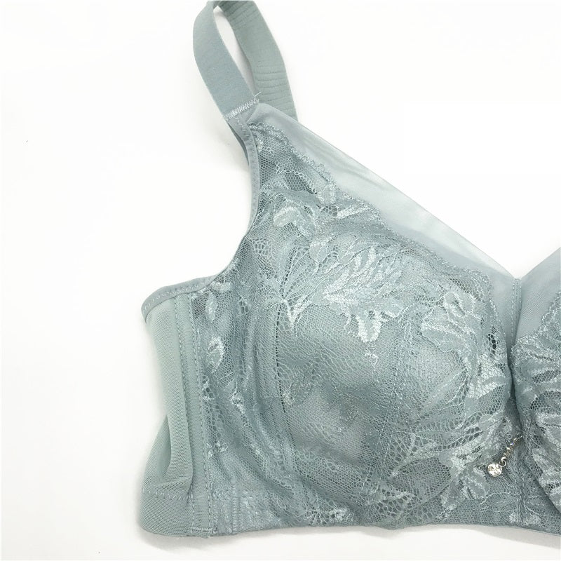 Side view of blue wireless minimizer contour bra showcasing wide straps and sidebands