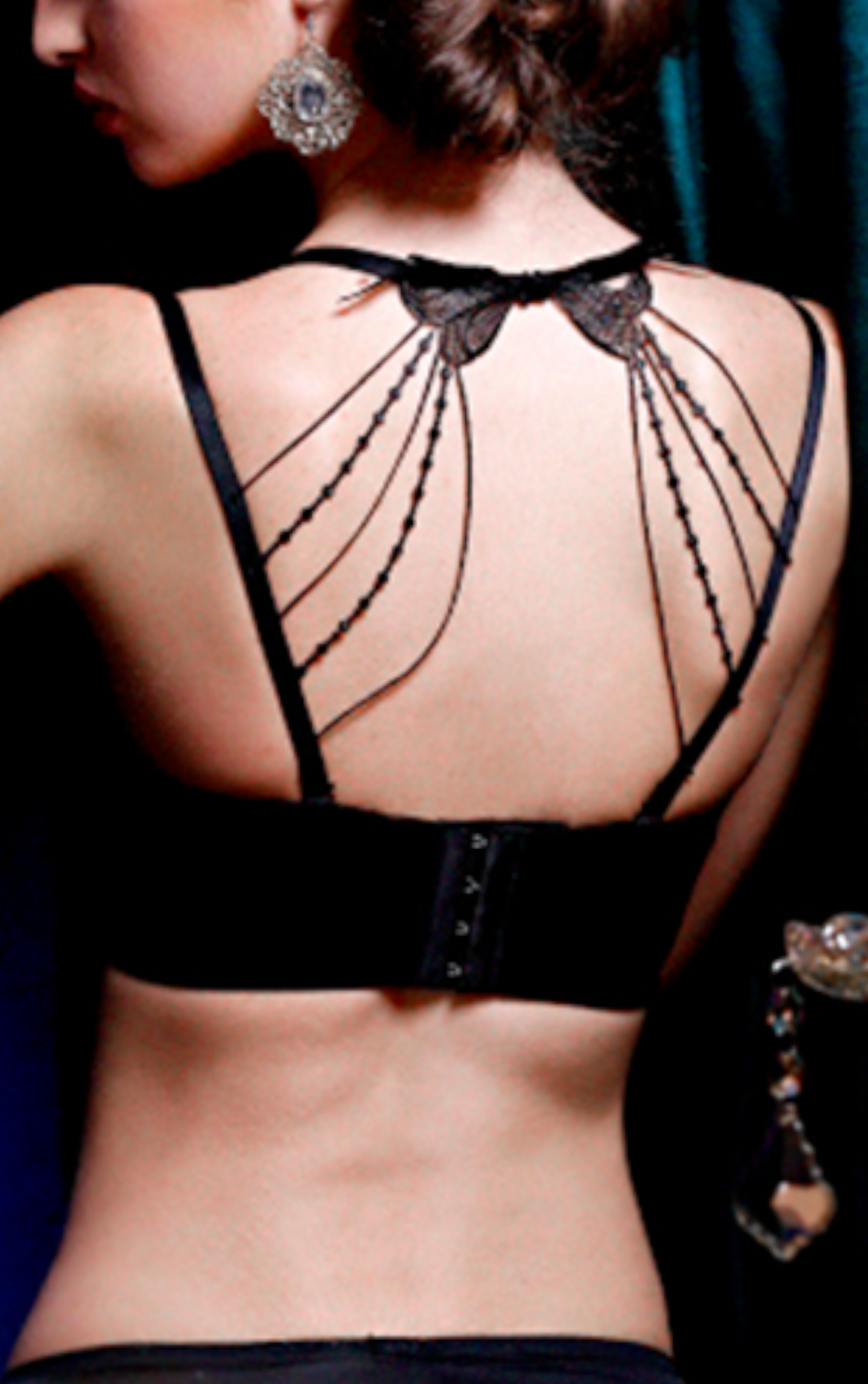 Front view of black seamless half cup contour bra with butterfly back and push-up lift