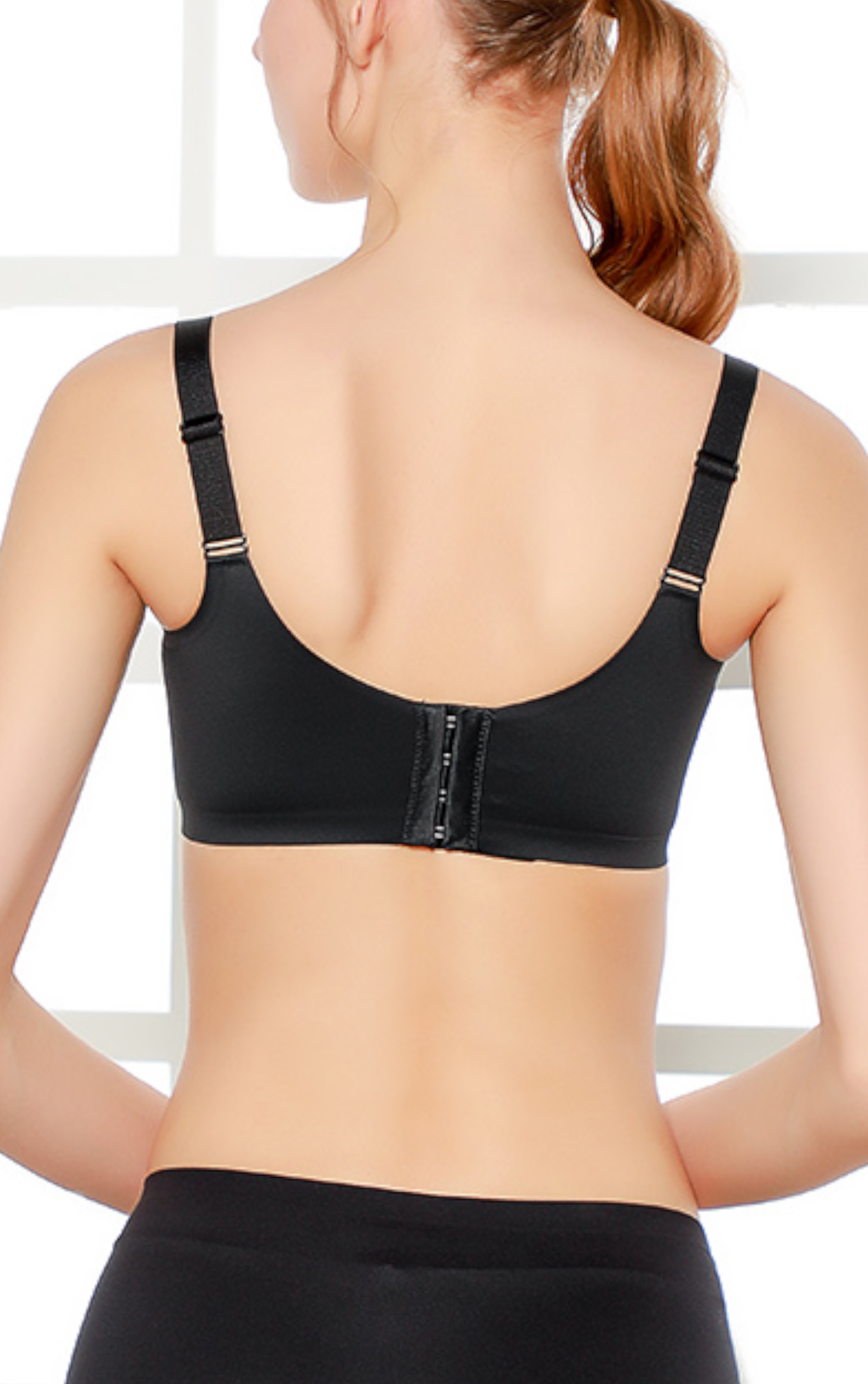 Front view of black seamless wireless push-up contour bra with lace detail and antibacterial cotton