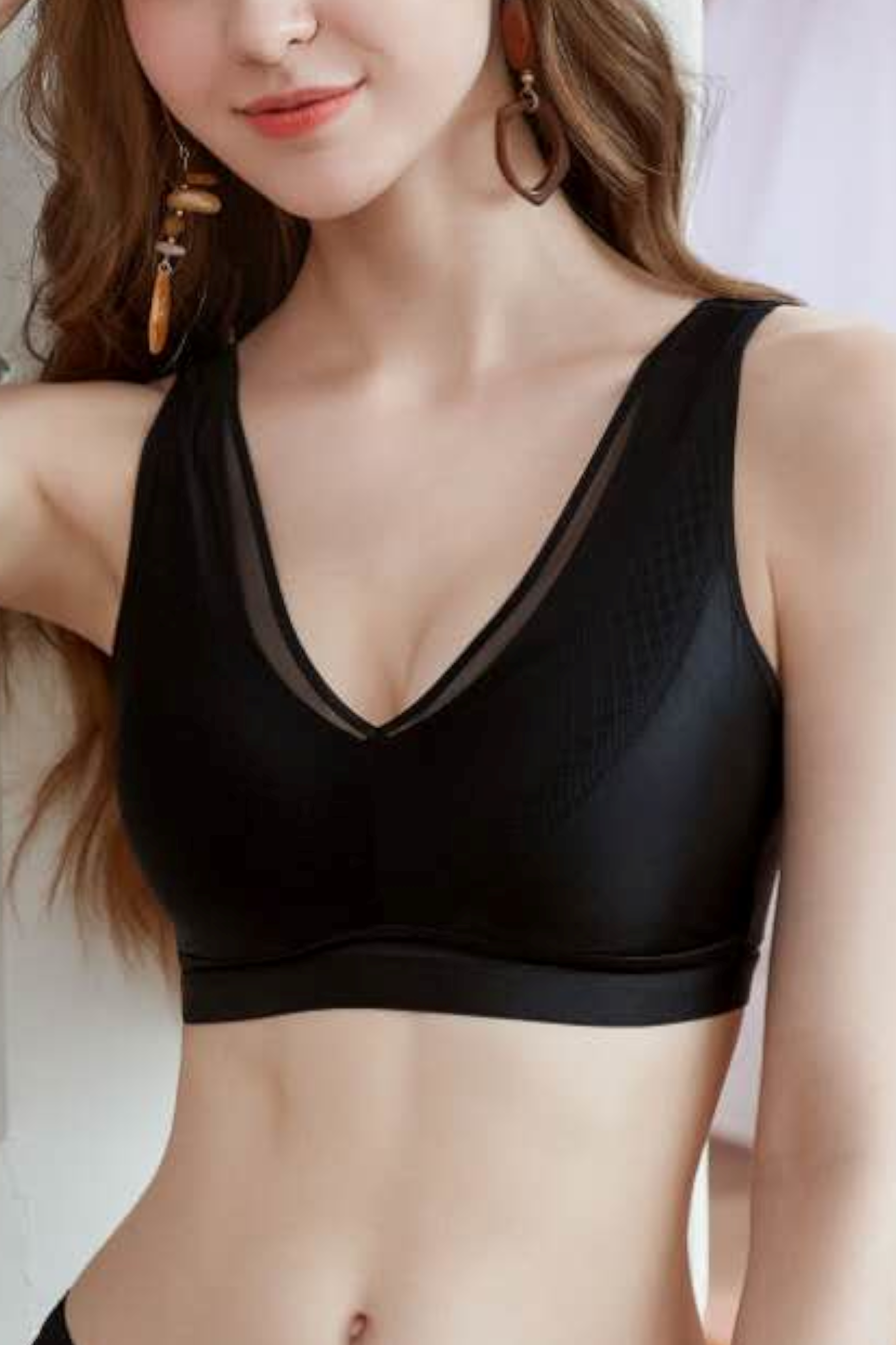 Front view of black satin wireless no-bulge contour bra with antibacterial comfort design