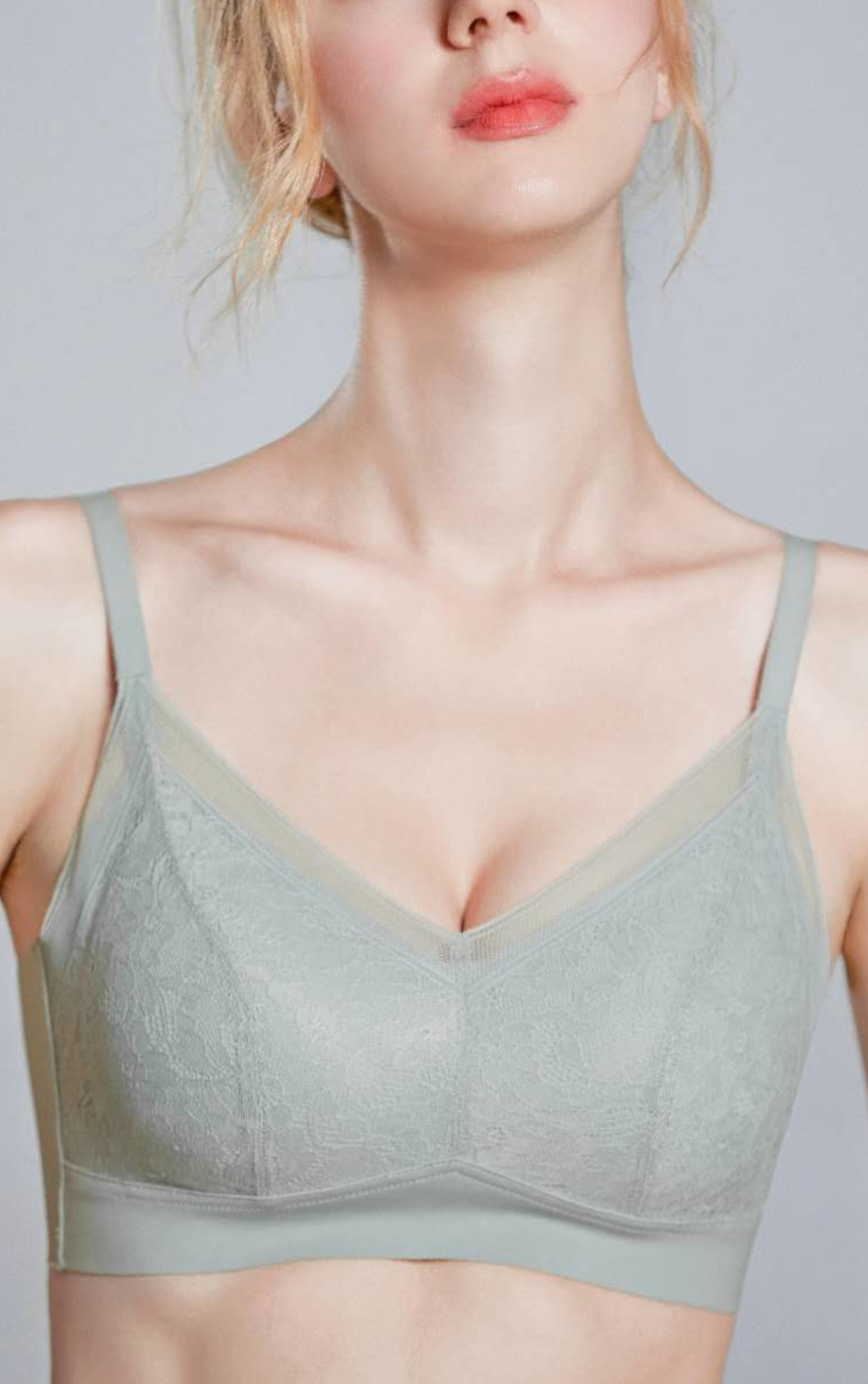 Front view of gray wireless cotton contour bra with floral lace accents and breathable fabric cups