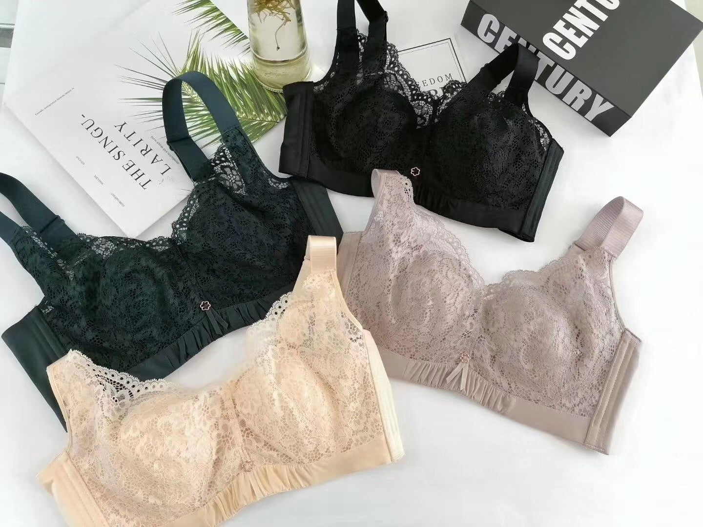 Front view of black lace underwire push-up contour bra with high side support panels