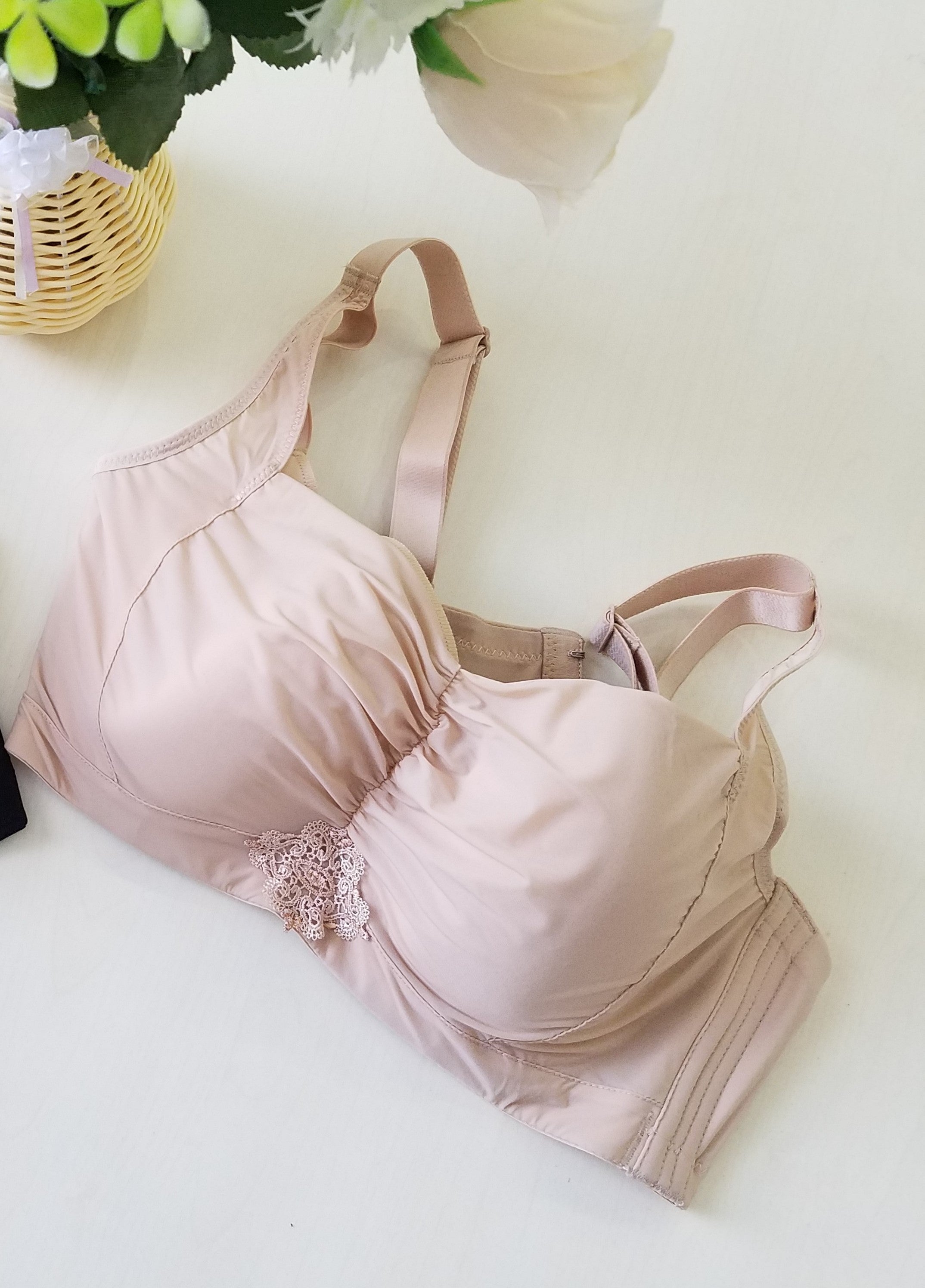 Side view of beige wireless contour bra highlighting double-layer side shaping panels