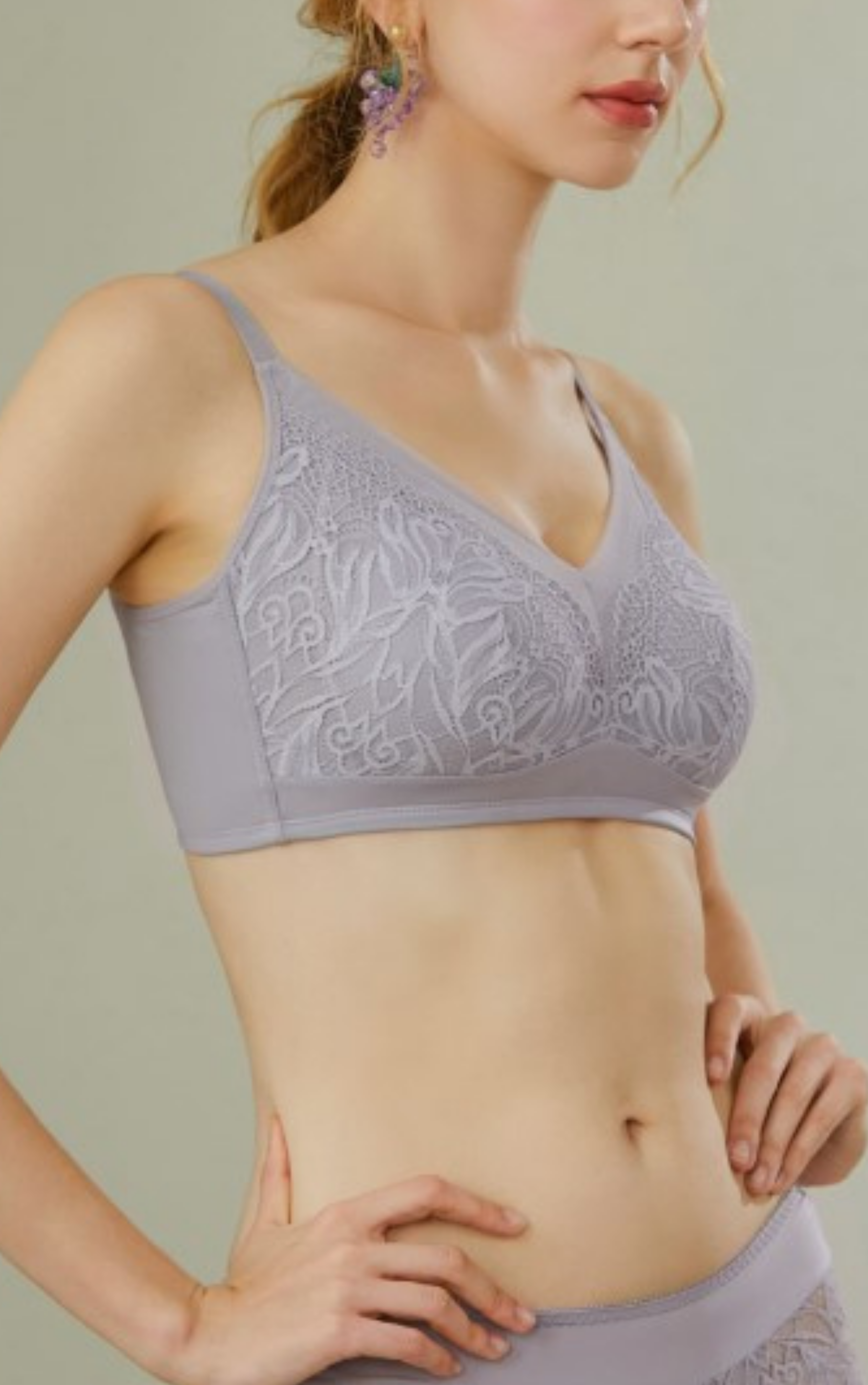 Side view of beige wireless minimizer contour bra showing cotton cups and wide smoothing panels