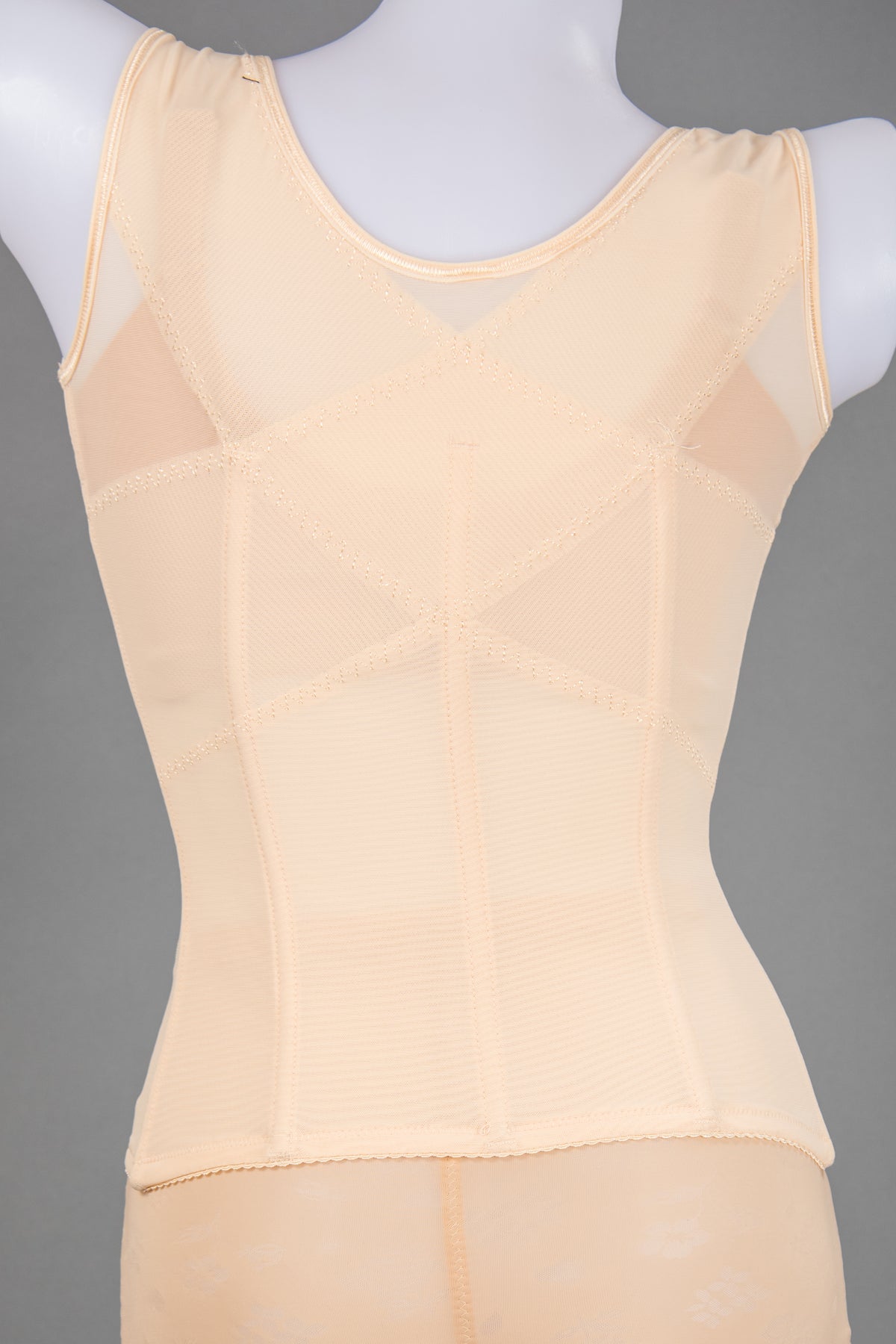 Front view of red lace open-bust camisole shapewear for special occasions