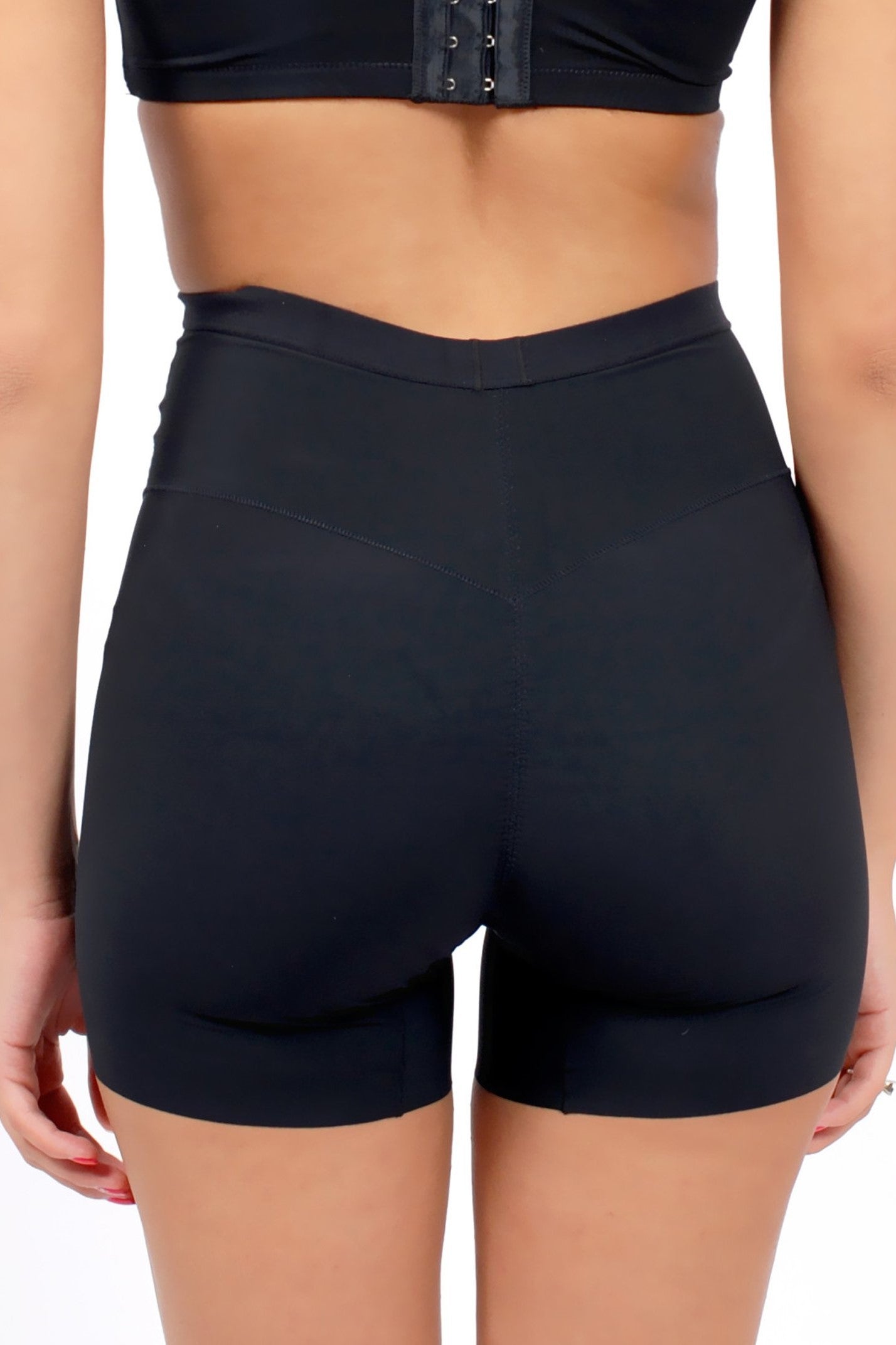 Front view of beige spandex butt lifter shapewear shorts with light compression for everyday wear